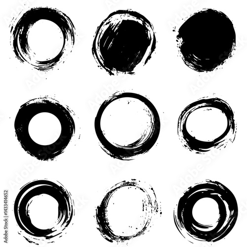Unique brush stroke circles created in black ink on white background for artistic designs
