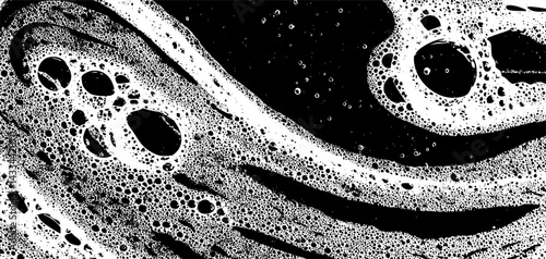 Intricate foam texture overlay forms unique wave patterns across a black background, showcasing dynamic shapes and contrasting visual elements that captivate the eye.