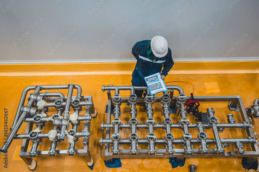 Male work inspection process stainless steel pipe stainless with pressure meter in equipment tank facility for drink cellar at the with vertical stainless valve