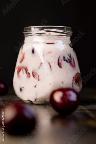 Obraz na płótnie fresh cow yogurt with cherry flavor and berry , jar with cherry yogurt with fresh red cherries w salonie
