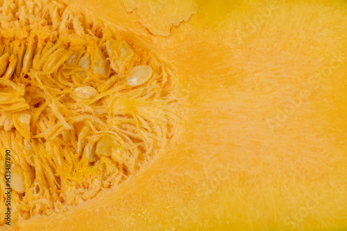 Obraz na płótnie cut orange pumpkin , orange pumpkin for cooking, pumpkin seeds inside w salonie
