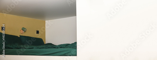 Modern loft bunk bed in white, smart space design with green lamp, wall accents, and ample copy space. Smart design concept