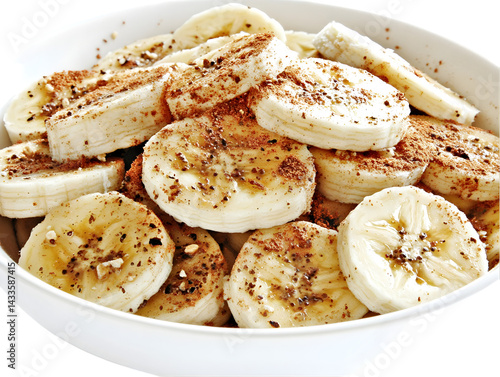 Obraz na płótnie Sliced Bananas In White Bowl With Brown Seasoning Isolated Photo w salonie