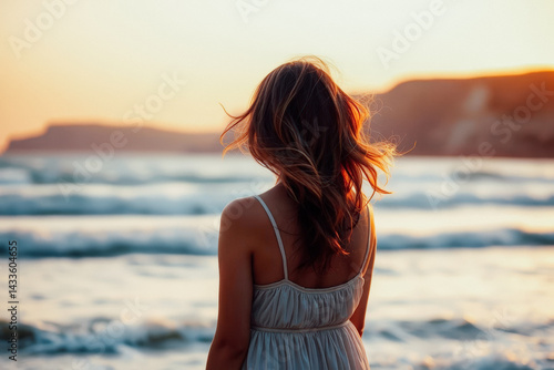 Obraz na płótnie Woman Contemplating Sunset at the Beach w salonie