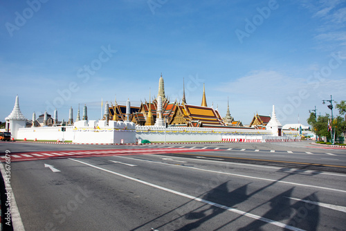 Landscape cityscape of BKK with traffic Ratchadamnoen Avenue and Wat Phra Si Rattana Satsadaram or Phra kaew temple while lockdown from Coronavirus COVID19 outbreak at Sanam Luang in Bangkok, Thailand