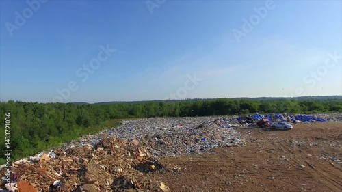 Aerial of large landfill full of trash in northern Canada