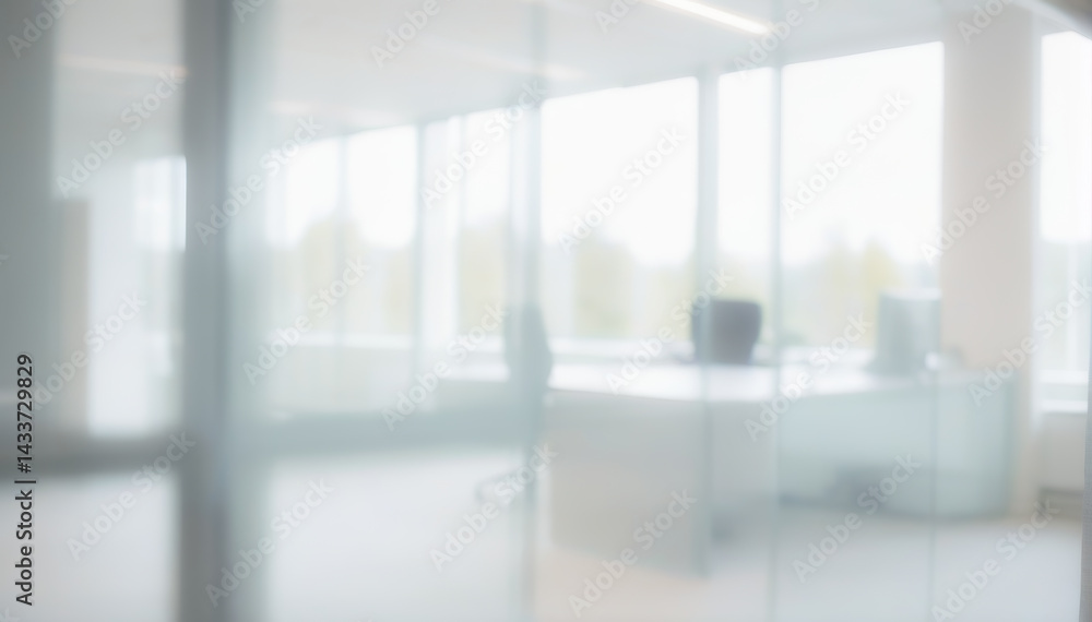 Blurred office interior with desk chair and large windows providing natural light. Modern bokeh photo with a touch of soft and warm light. Blurred office interior with desk chair and large windows providing natural light. Modern bokeh photo with a touch of soft and warm light.