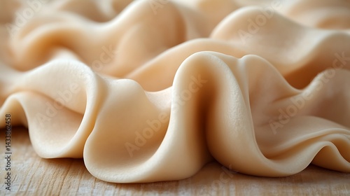 Creamy Beige Substance Forms Abstract Waves