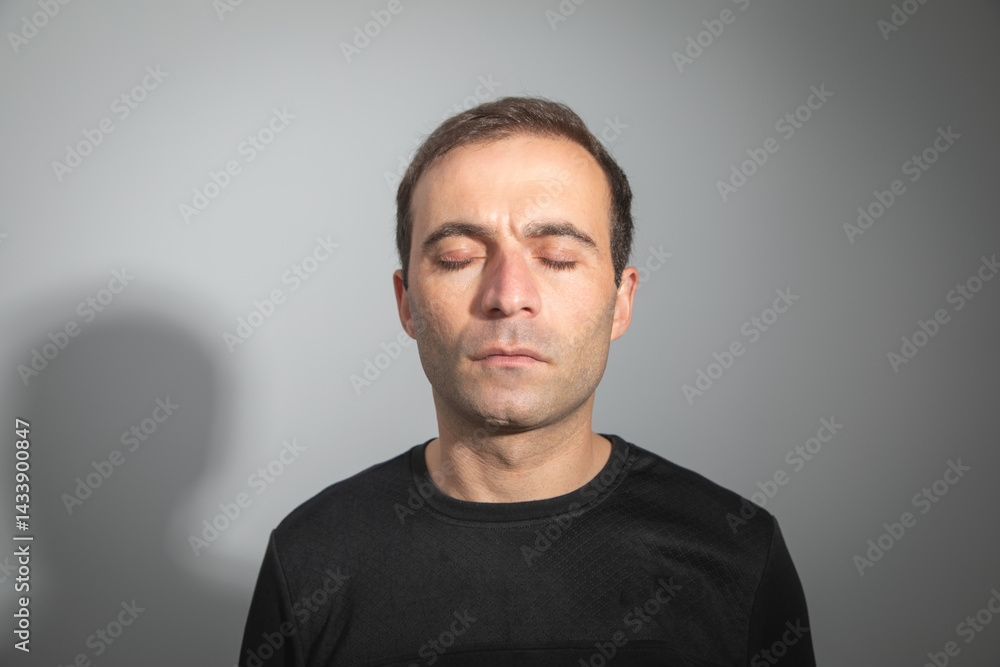 Caucasian man with a closed eyes. Caucasian man with a closed eyes.