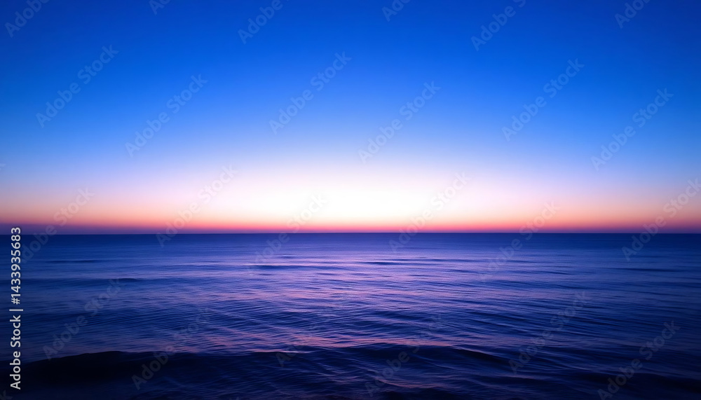 Fototapeta premium Twilight Over a Calm Ocean: Horizon with Gentle Waves