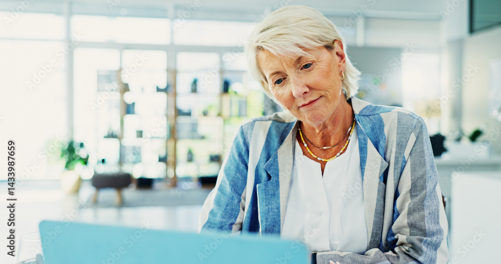 Obraz premium Business, mature woman and laptop in office for accounting, finance research and reading report. Smile, female person and online with financial management, audit payroll and review budget for company