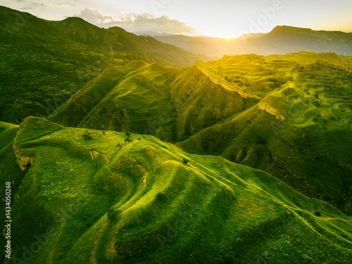 Obraz na płótnie View of the green agricultural terraces in the mountains at sunset. Chokh village in Dagestan, Russia. w salonie