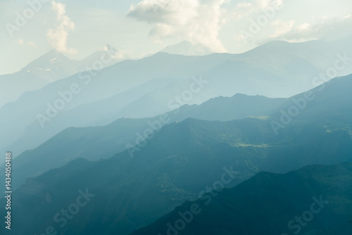 Obraz na płótnie View of the mountains and blue sky with clouds at sunset. Dagestan, Russia. w salonie