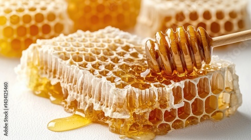 Close-up of fresh honeycomb with golden honey dripping off, detailed texture highlighting hexagonal beeswax cells and natural sweet nectar for food or nature themes