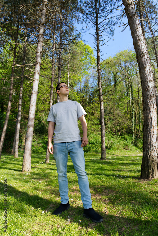 Man contemplating in beautiful forest Man contemplating in beautiful forest