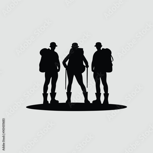 Silhouette of Three Hikers with Backpacks and Trekking Poles
