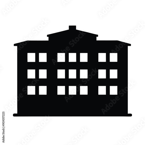 Silhouette of a three story building with multiple windows and rooftop structure