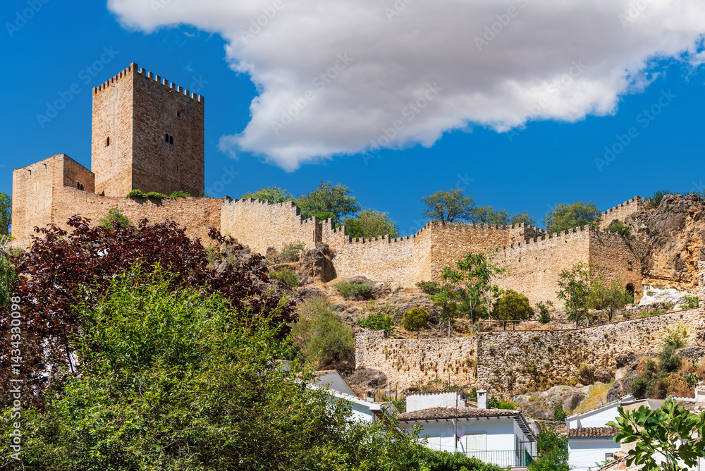 Imposing keep tower and fortified walls of Yedra Castle, Cazorla, Jaén, Spain.