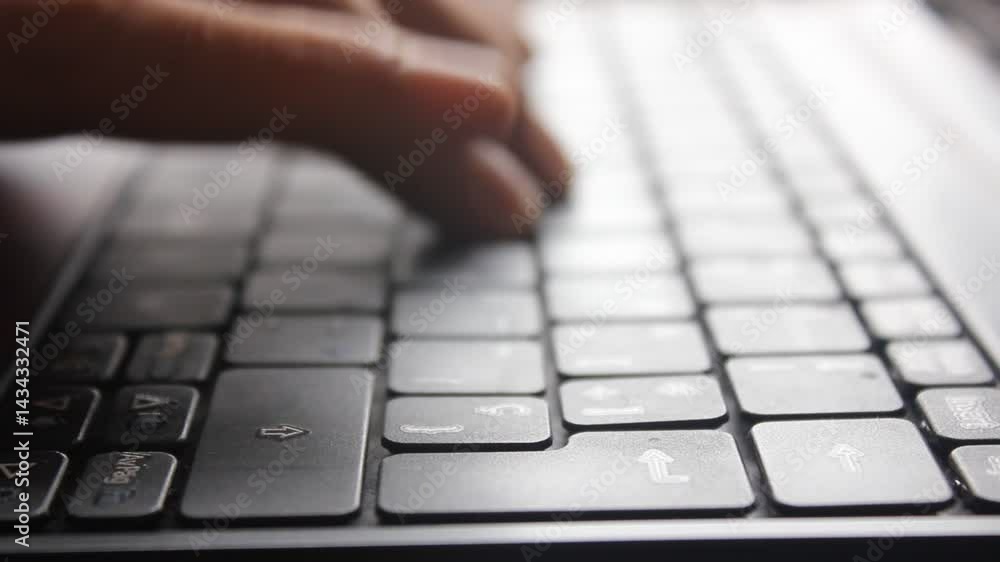 Close-up of Hands Typing on a Laptop Keyboard Close-up of Hands Typing on a Laptop Keyboard