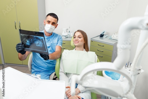 x-ray dentist, dentist consulting, dentist indicates, male doctor examining, dentist is showing x-ray, dental health, smiling patient, hospital office, healthy teeth, stomatological cabinet