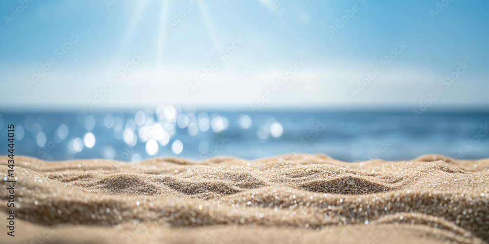 Background with sand in the foreground and sky in the background. summer beach nature with rays of sunlight. golden sand beach. sea water against blue sky with clouds