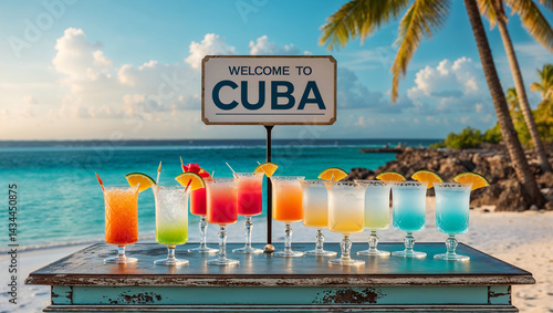 Obraz na płótnie lots of cocktails on the table against the backdrop of a stunning seascape, the inscription Welcome to Cuba w salonie