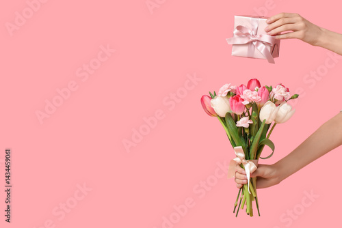 Female hands with gift box ...