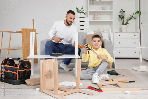 Father and son assembling f...