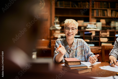 Young and diverse group of students studying in a university library