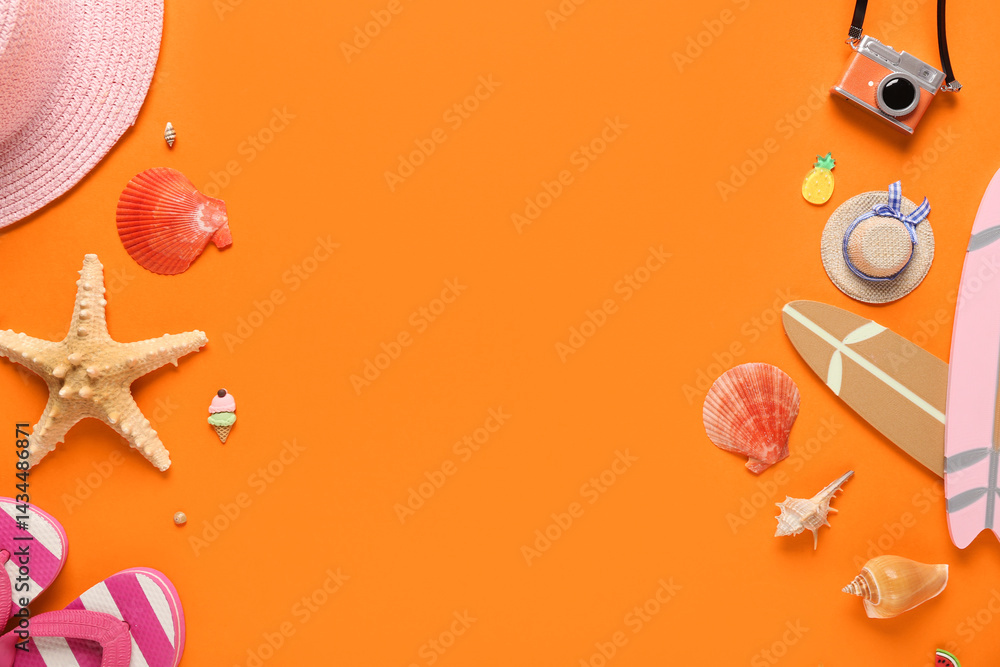 Different beach decor on orange background
