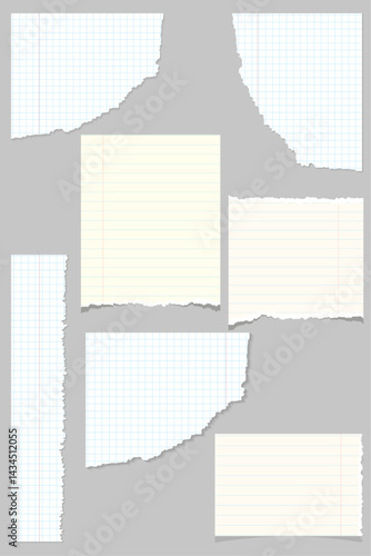 Torn paper pieces taped on gray background