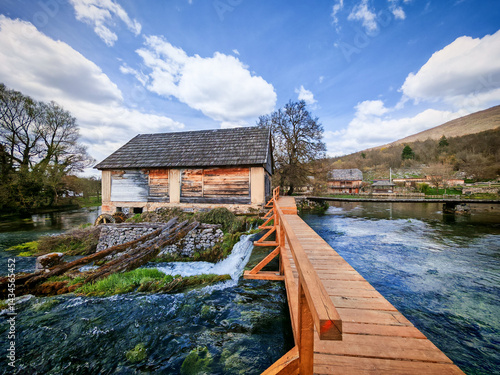 Beautiful wooden mills of Majerovo Vrilo in the village of Sinac, Croatia, located on the river Gacka spring, famous tourist destination and example of preserved rural architecture