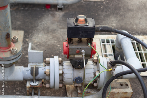 Slika na platnu close-up industrial valve with pneumatic actuator