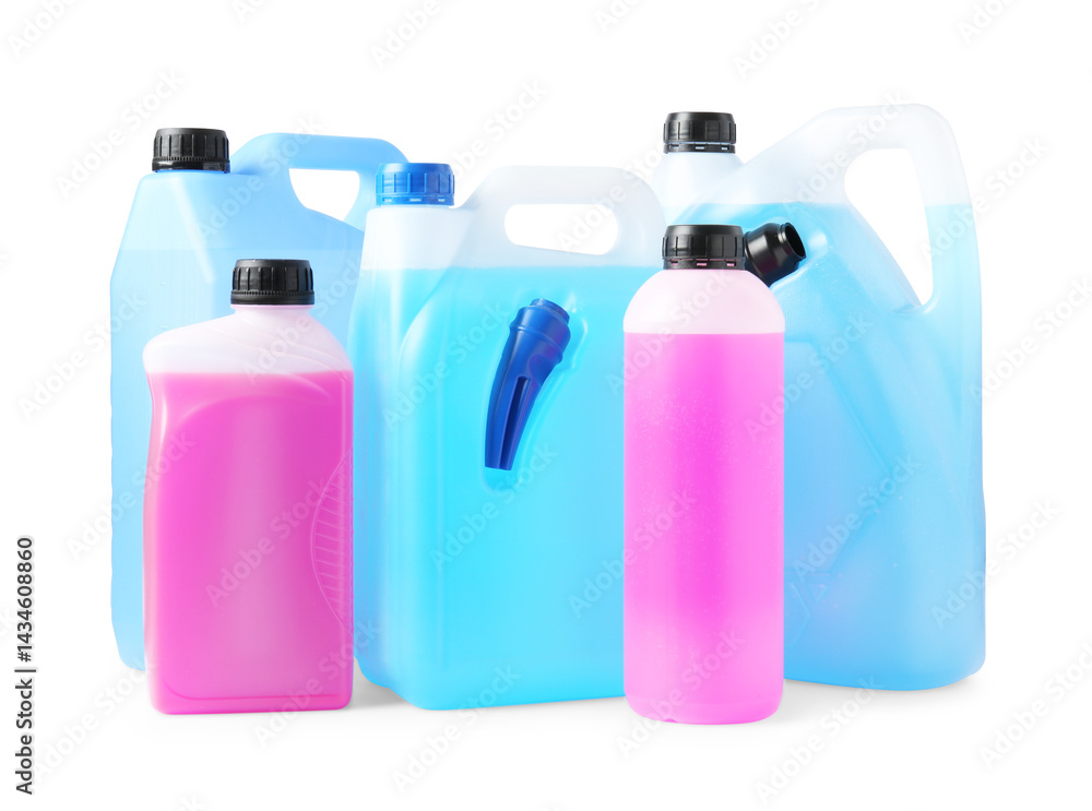 Antifreeze in plastic canisters and bottles isolated on white Antifreeze in plastic canisters and bottles isolated on white