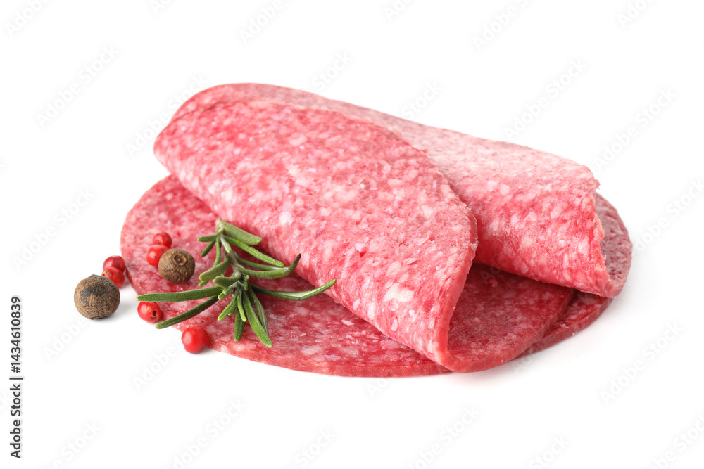 Slices of tasty smoked sausage with spices isolated on white Slices of tasty smoked sausage with spices isolated on white