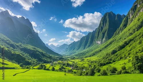 Wallpaper Mural Green grass and rocky peaks define the panoramic mountain landscape of the Alps under a summer sky Torontodigital.ca