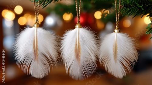 Delicate white feather baubles hang gracefully from the Christmas tree, adding a touch of elegance to festive dcor.