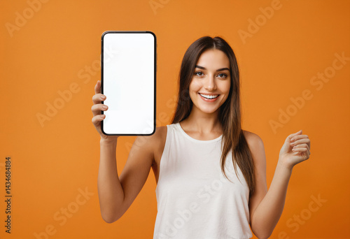 excited woman holding smart...