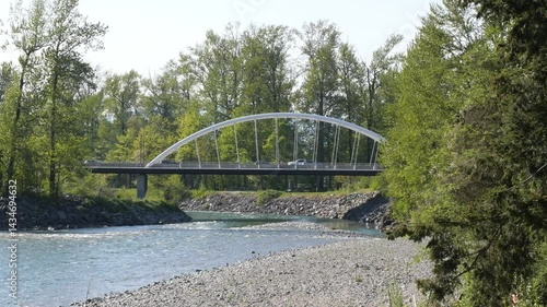 Vedder Bridge across Chilliwack River as seen from the Vedder Rotary Trail North during a spring season in Chilliwack, Fraser Valley, British Columbia, Canada