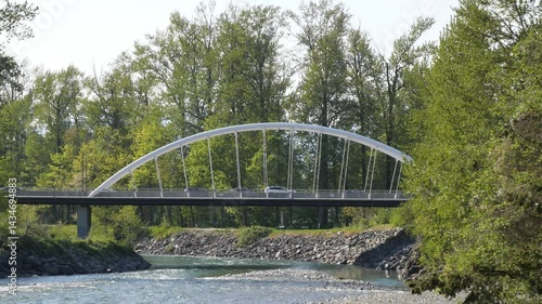 Vedder Bridge across Chilliwack River as seen from the Vedder Rotary Trail North during a spring season in Chilliwack, Fraser Valley, British Columbia, Canada