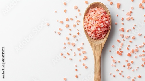 Himalayan Pink Salt Crystals in Wooden Spoon on Textured White Background for Cooking and Wellness Minimalist Still Life