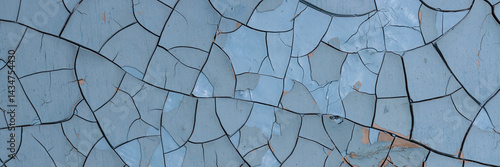 Obraz na płótnie Peeling paint on the wall. Panorama of a concrete wall with old cracked flaking paint. Weathered rough painted surface with patterns of cracks and peeling. Wide panoramic texture for grunge background w salonie