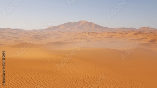 Vast Golden Sand Dunes Under Clear Sky with Distant Mountain View in Desert Landscape