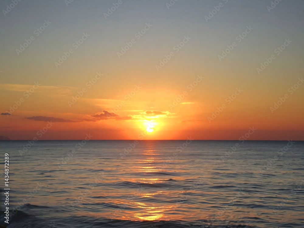 Obraz premium sunset over the sea. sunset, sea, sun, sky, ocean, water, sunrise, beach, nature, clouds, horizon, orange, cloud, landscape, dawn, evening, reflection, beautiful, coast, morning, waves, red, dusk, blu
