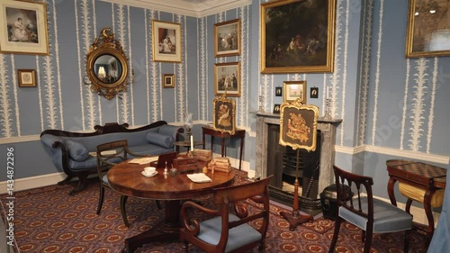 The Interior Of The Living Room Of A Wealthy 19th Century English House