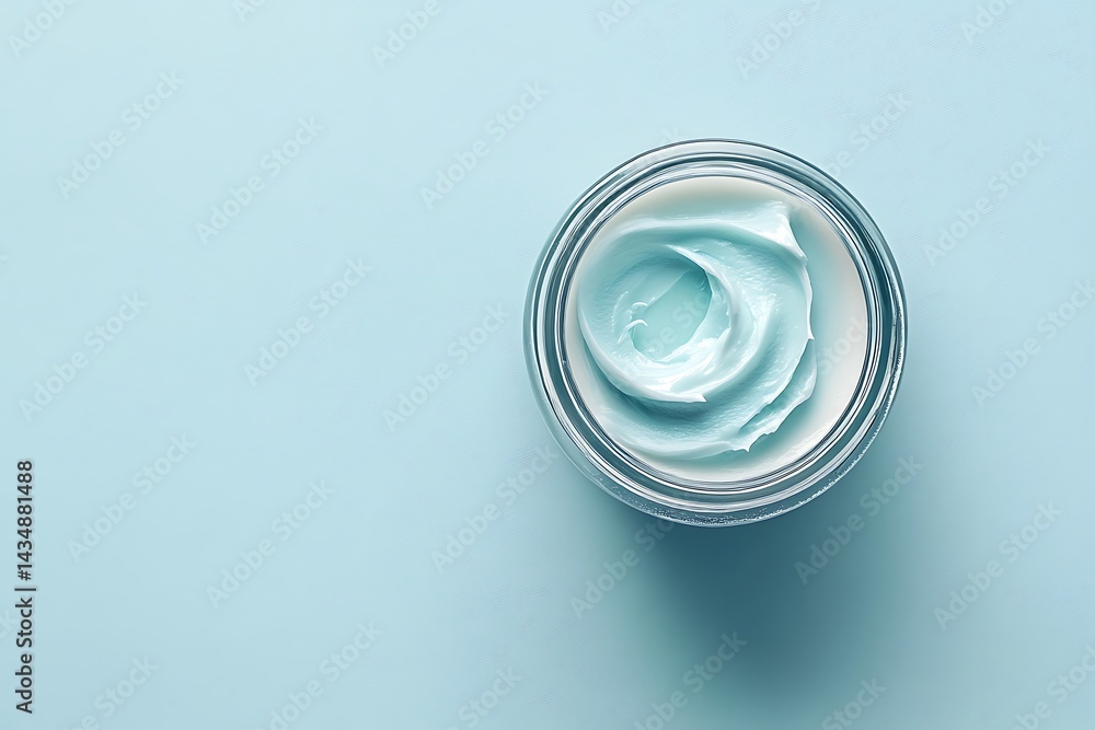 Top view of jar with light blue moisturizing cream on pastel background, skincare and beauty product Top view of jar with light blue moisturizing cream on pastel background, skincare and beauty product
