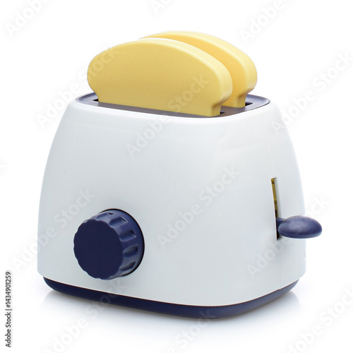 A plastic toy toaster with bread on a white background.