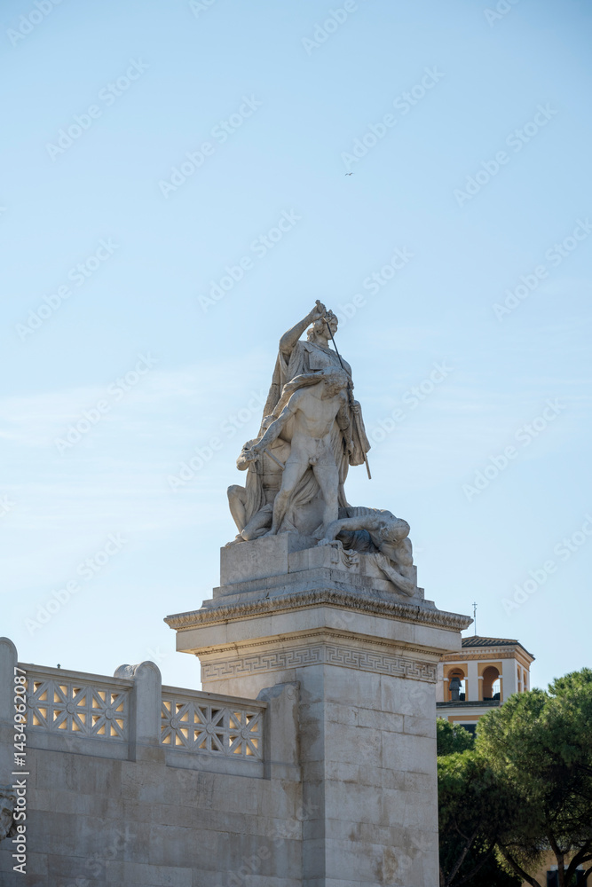 Naklejka premium The Victor Emmanuel II National Monument, also known as the Vittoriano or for synecdoche Altare della Patria, is a large national monument built between 1885 and 1935 to honour Victor Emmanuel II, the