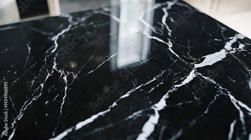Obraz na płótnie Elegant close-up of a polished black marble countertop with white veining w salonie