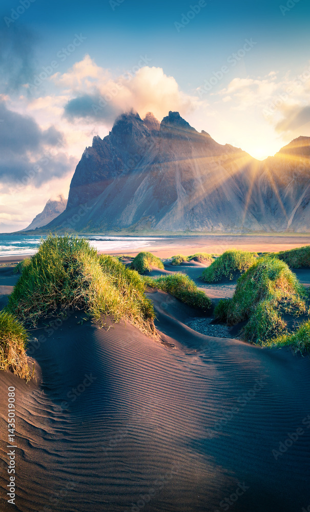 Black sand dunes on the Stokksnes headland on southeastern Icelandic coast with Vestrahorn (Batman Mountain)